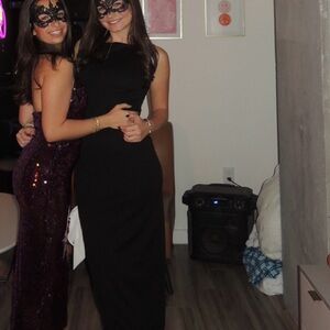 More To Come black dress with white bow